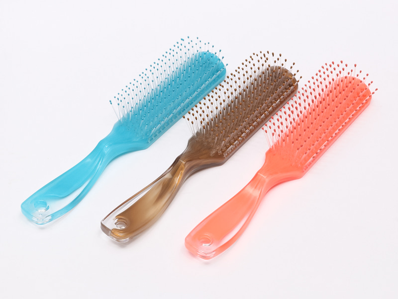 Cepillo de pelo con pasador de nailon con ventilación
