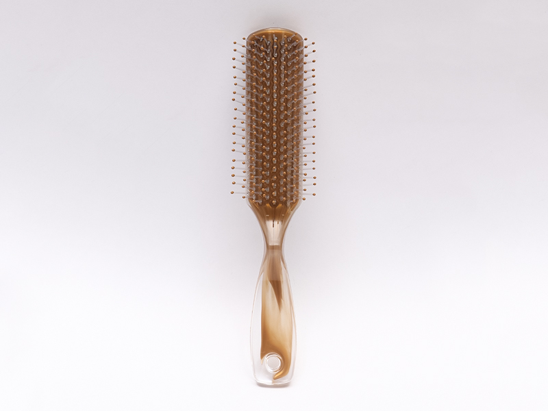 Cepillo de pelo con pasador de nailon con ventilación