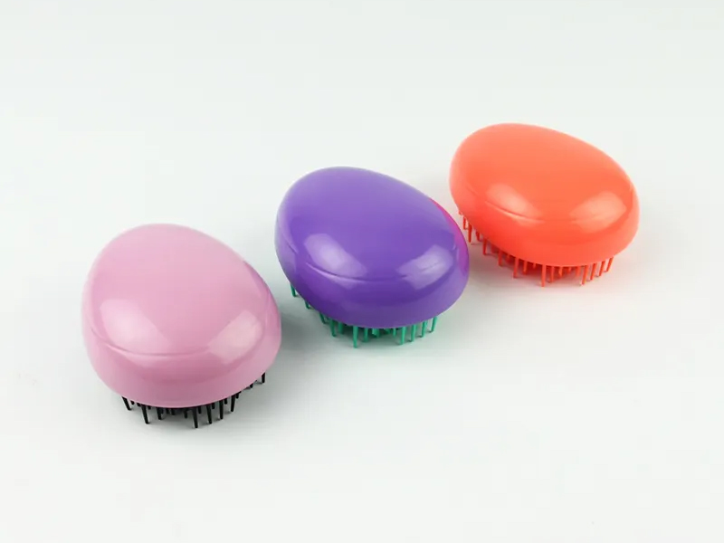 Mini cepillo de pelo para niños con forma de huevo