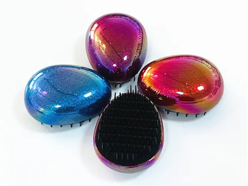 Mini cepillo para el cabello para desenredar en forma de huevo para niños