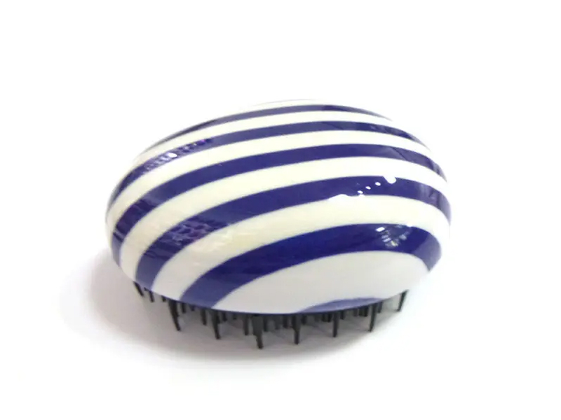 Cepillo de pelo pequeño de huevo desenredante de color lavanda transparente para niños