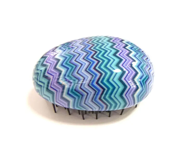 Cepillo de pelo pequeño de huevo desenredante de color lavanda transparente para niños