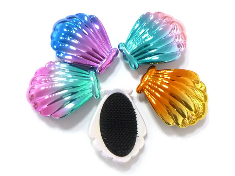 Mini cepillo de pelo electrochapado en forma de concha para niños