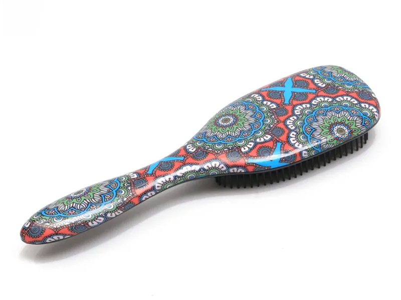 Cepillo de pelo rizado de nailon con cojín para desenredar
