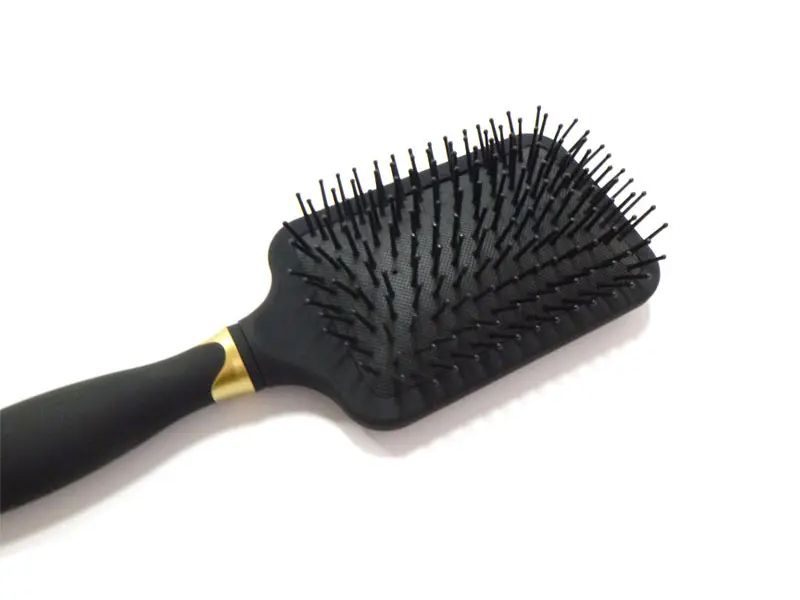Cepillo de pelo con revestimiento de goma para desenredar