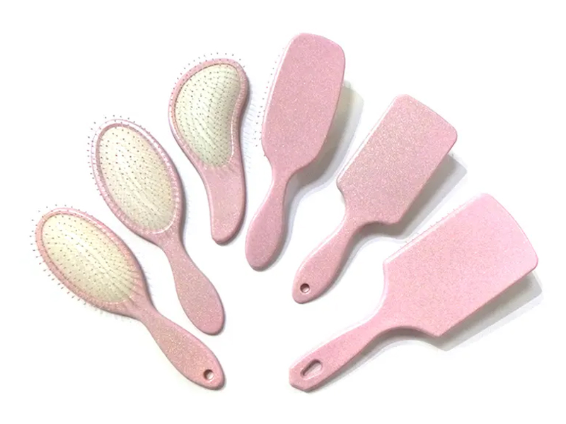 Cepillo de pelo de paleta elegante de plástico rosa