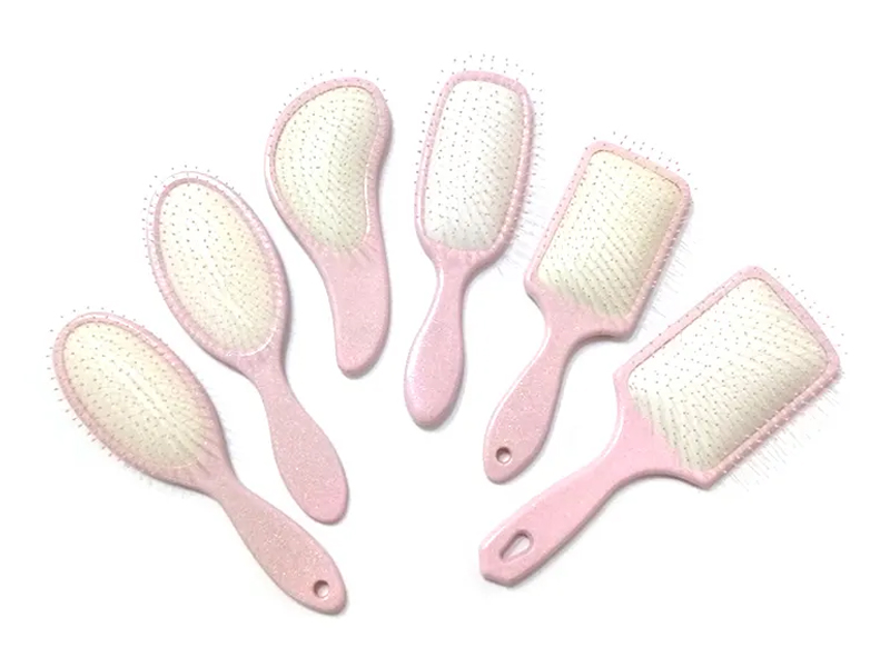 Cepillo de pelo de paleta elegante de plástico rosa