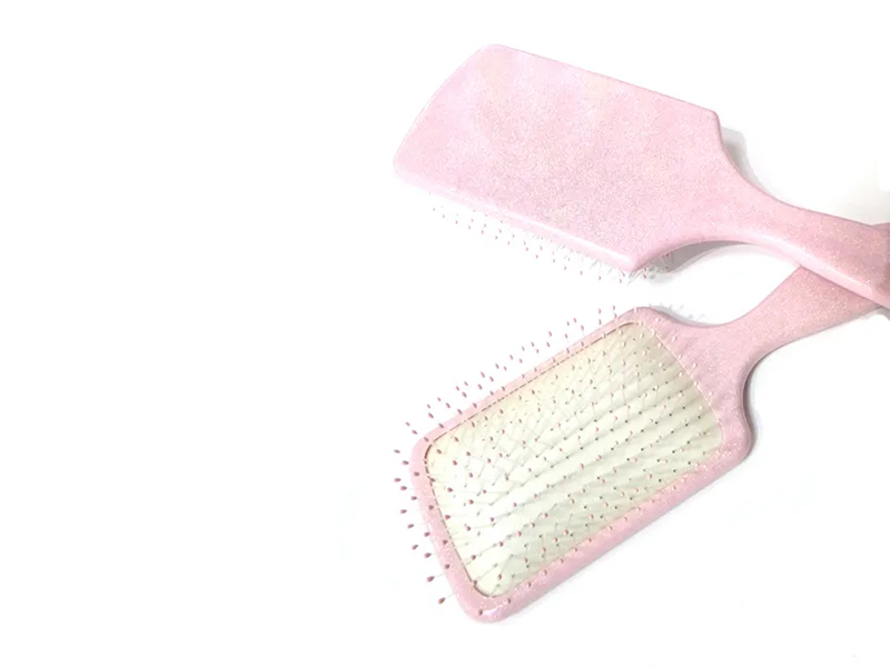 Cepillo de pelo de paleta elegante de plástico rosa