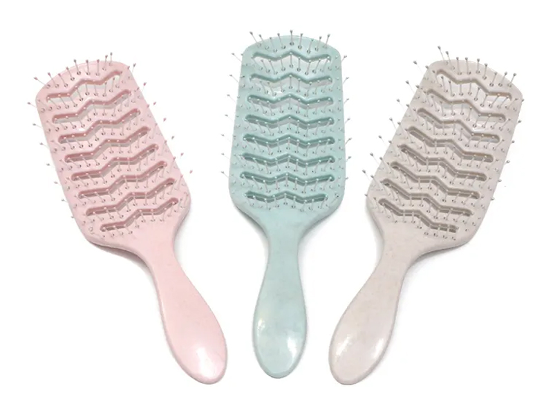 Cepillo de pelo desenredante impermeable respetuoso del medio ambiente del ABS portátil plástico rosado