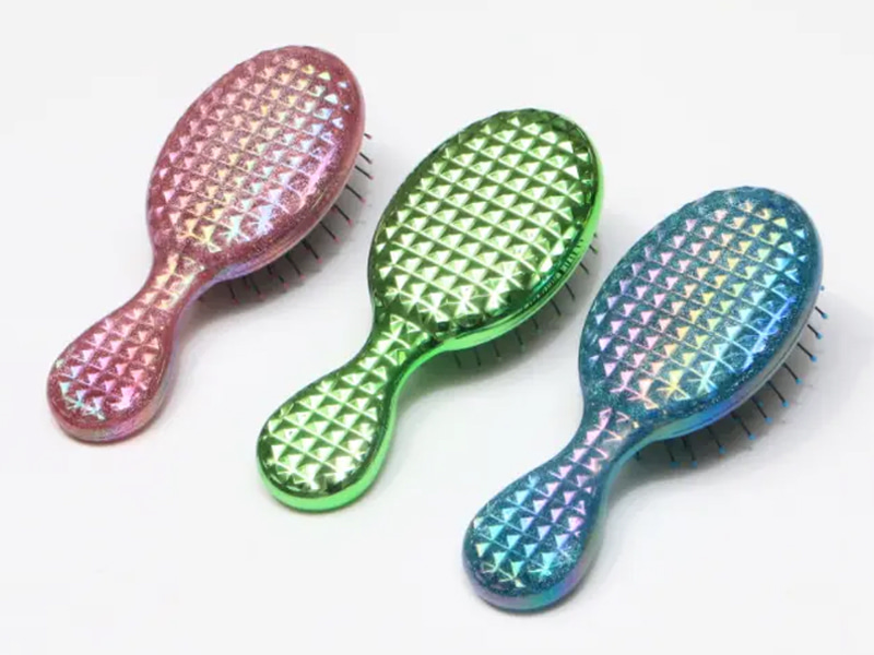 Mini cepillo desenredante brillante para niños