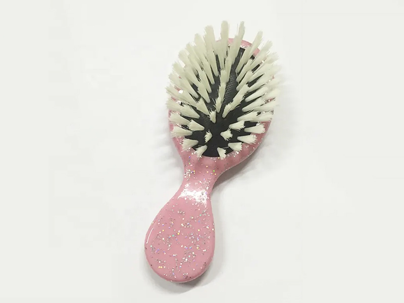 Mini cepillo de pelo colorido para desenredar para niños