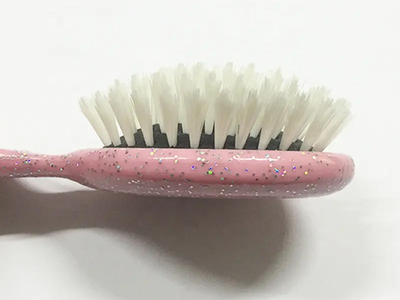 Mini cepillo de pelo colorido para desenredar para niños