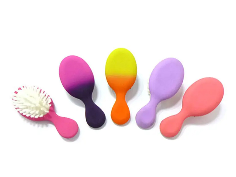 Mini cepillo de pelo desenredante de colores para niños
