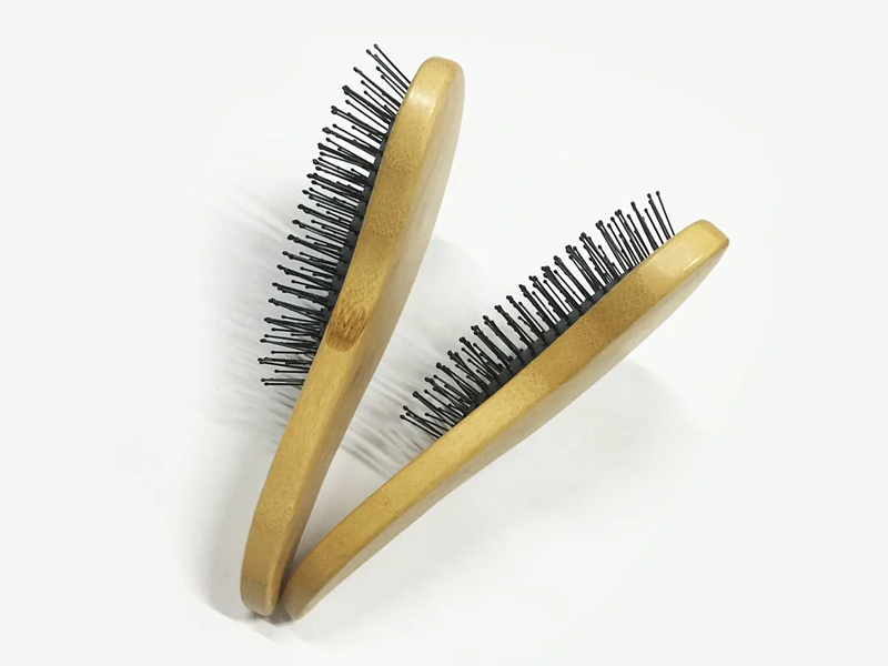 Cepillo de pelo con cojín desenredante de bambú