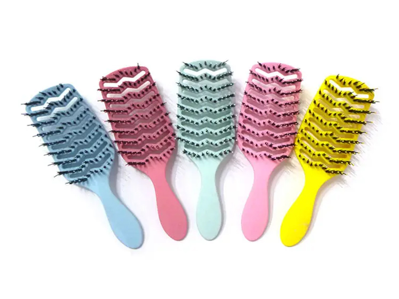 Cepillo de extensión de cabello con paleta de ventilación curva