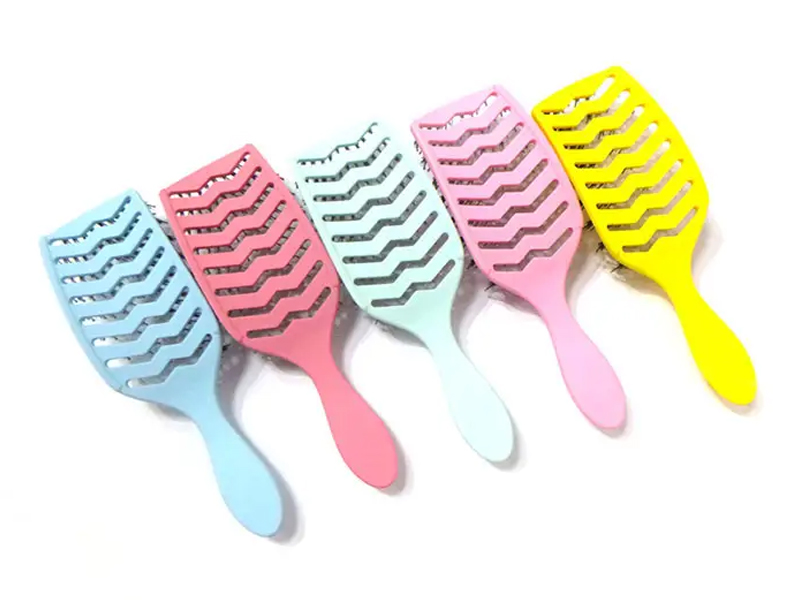 Cepillo de extensión de cabello con paleta de ventilación curva