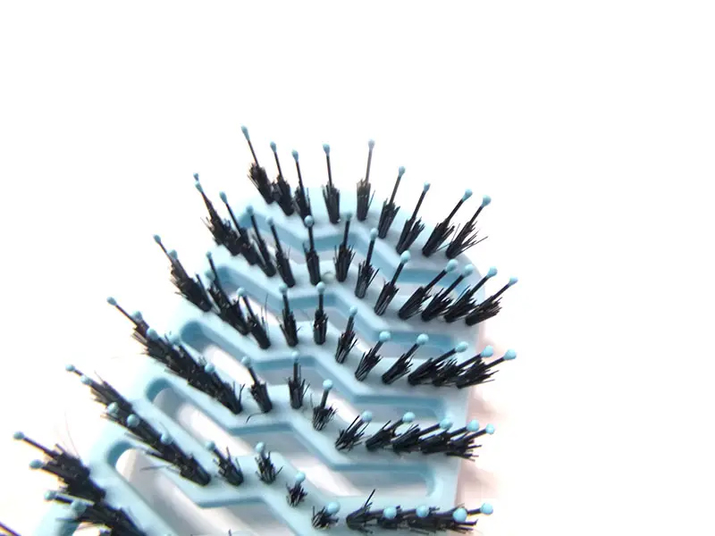 Cepillo de extensión de cabello con paleta de ventilación curva