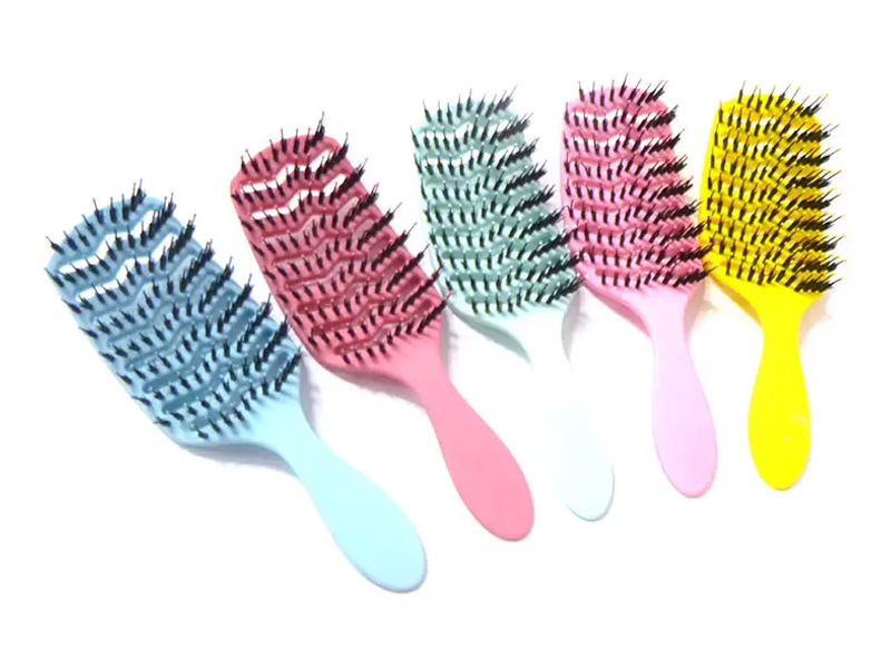 Cepillo de extensión de cabello con paleta de ventilación curva