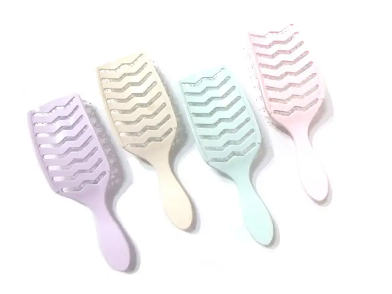 Cepillo de pelo desenredante rosado portátil plástico del ABS del masaje impermeable respetuoso del medio ambiente