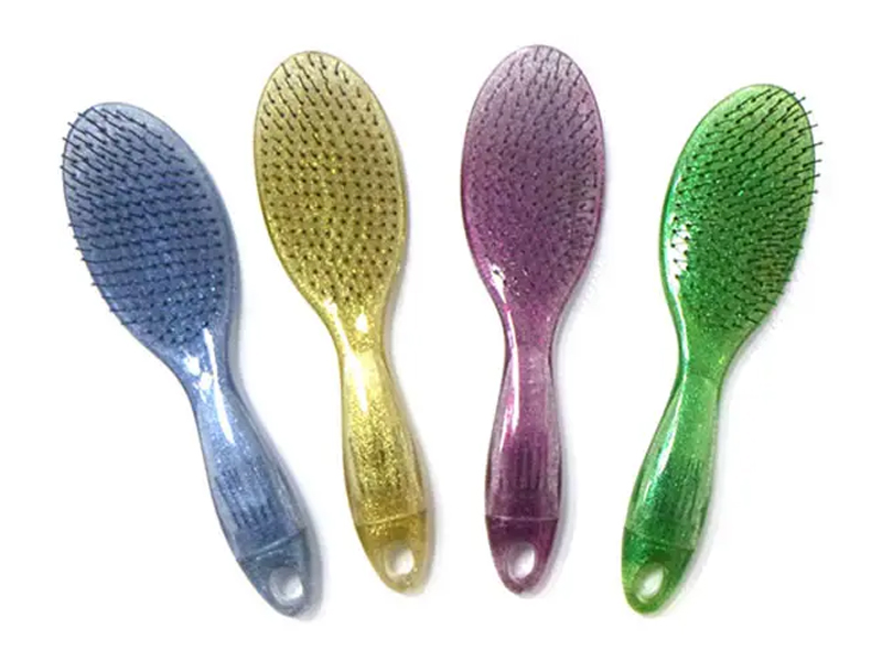 Cepillo de pelo transparente con purpurina desenredante