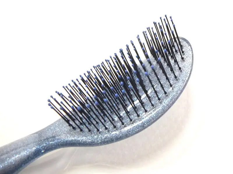 Cepillo de pelo transparente con purpurina desenredante
