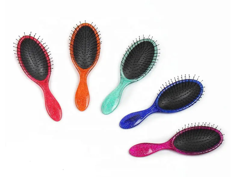Cepillo de pelo ovalado de paleta de plástico ABS para desenredar