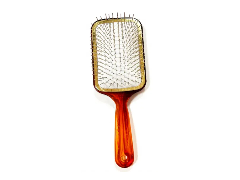 Cepillo de pelo de paleta de color ámbar con pasadores de metal