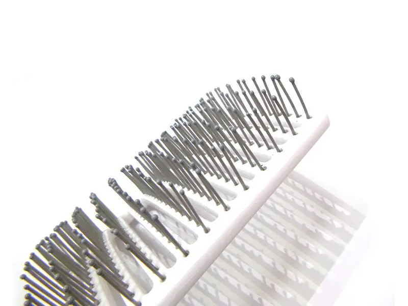 Cepillo de pelo para desenredar con ventilación de plástico